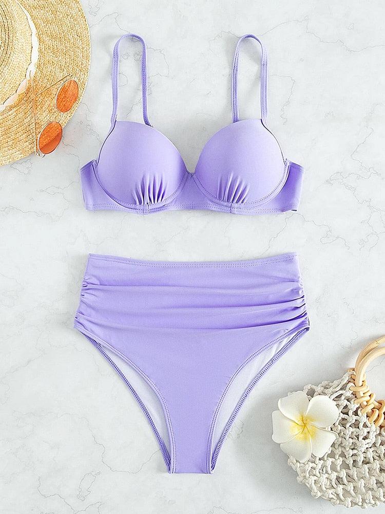 Burq | Beach Wave Bikini | Een kleurrijke push-up bikini met een hoog uitgesneden slipje.