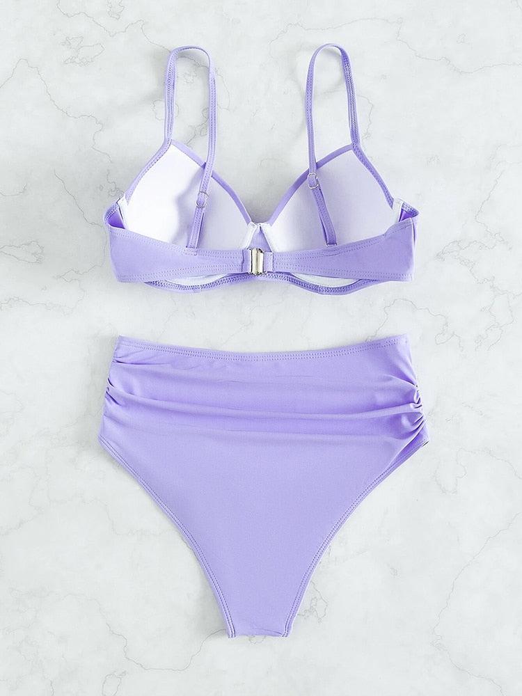 Burq | Beach Wave Bikini | Een kleurrijke push-up bikini met een hoog uitgesneden slipje.