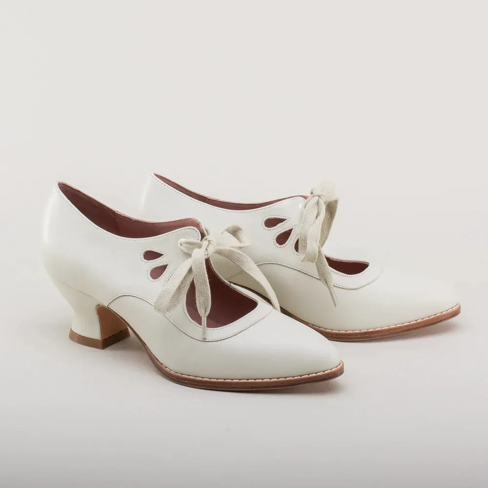 Burq | Elegante retro schoenen met lage hak