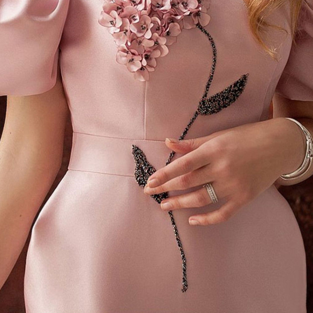 Burq | Elegante temperamentjurk met bubbelmouwen