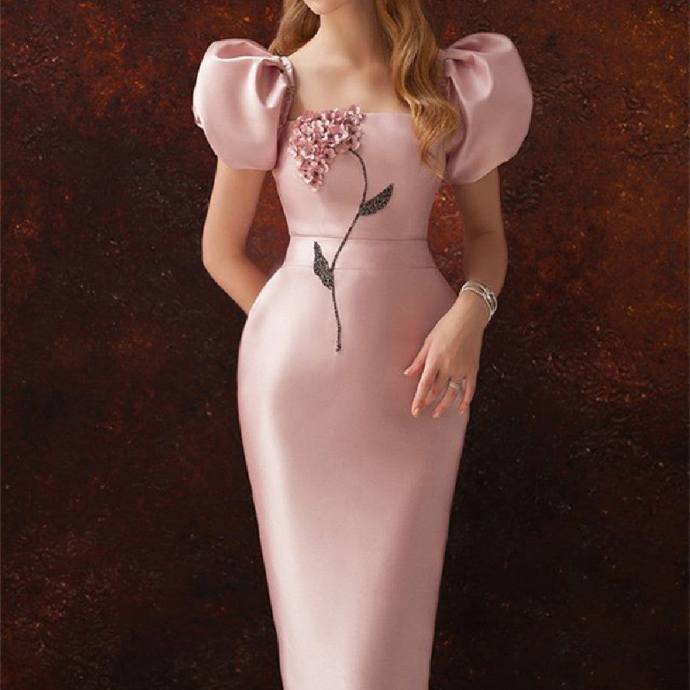 Burq | Elegante temperamentjurk met bubbelmouwen