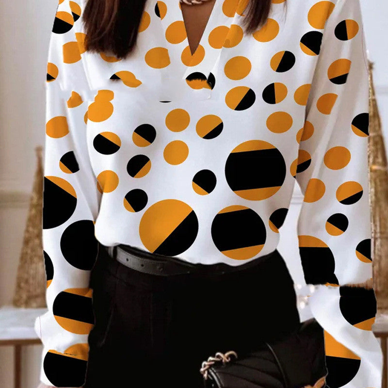 Burq | Trendy ronde damesblouse met V-hals en print